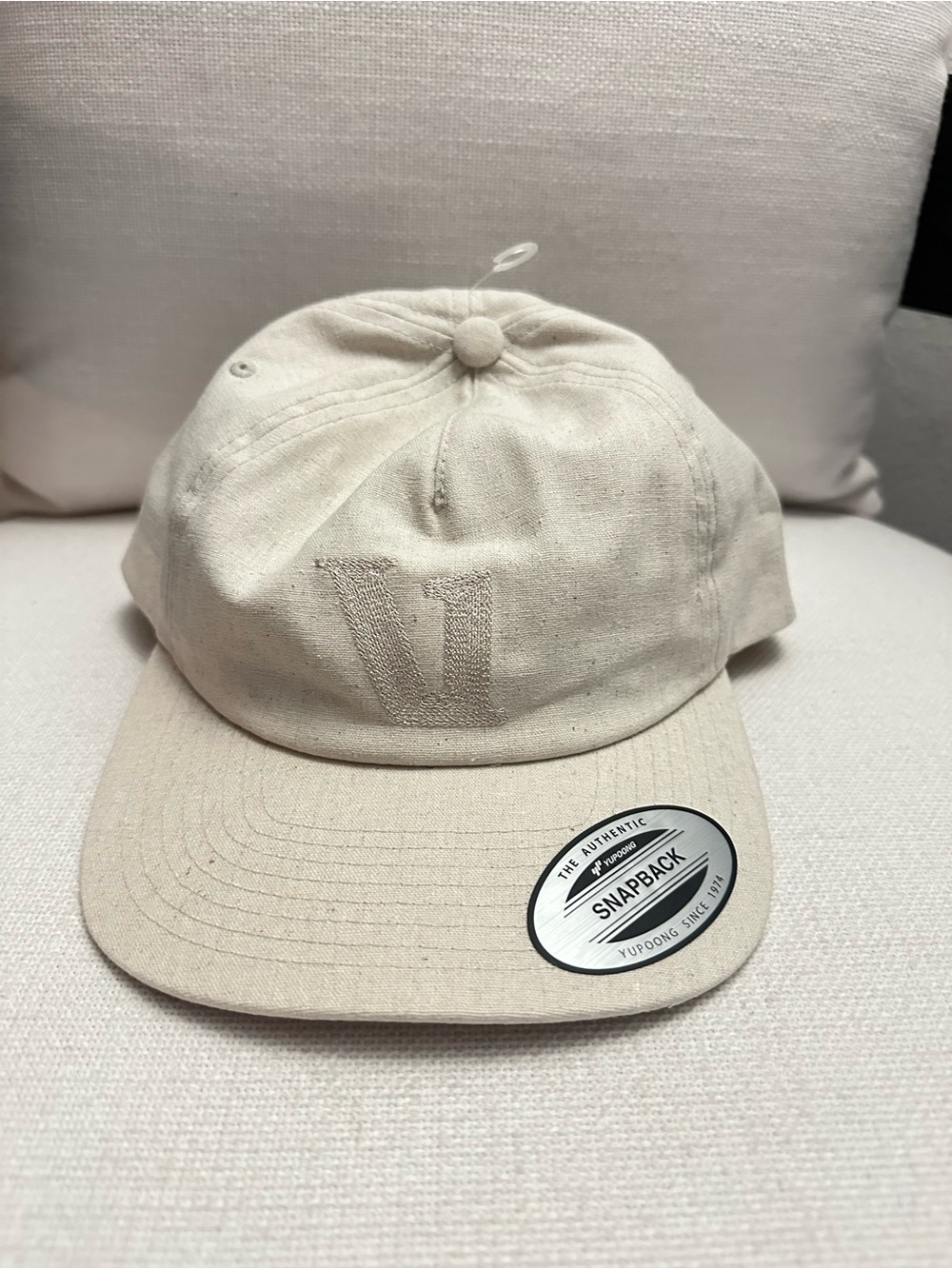 Vuori Natural Canvas Snapback Cap with Subtle Logo